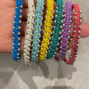 Multiple colourful bracelets